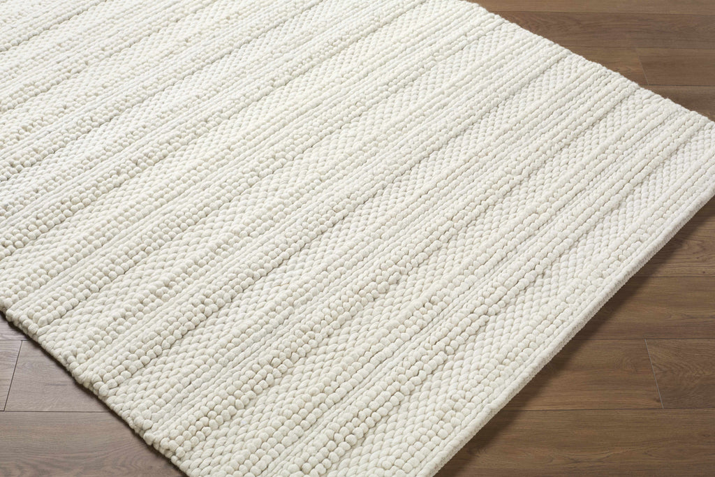 Coskun Area Rug