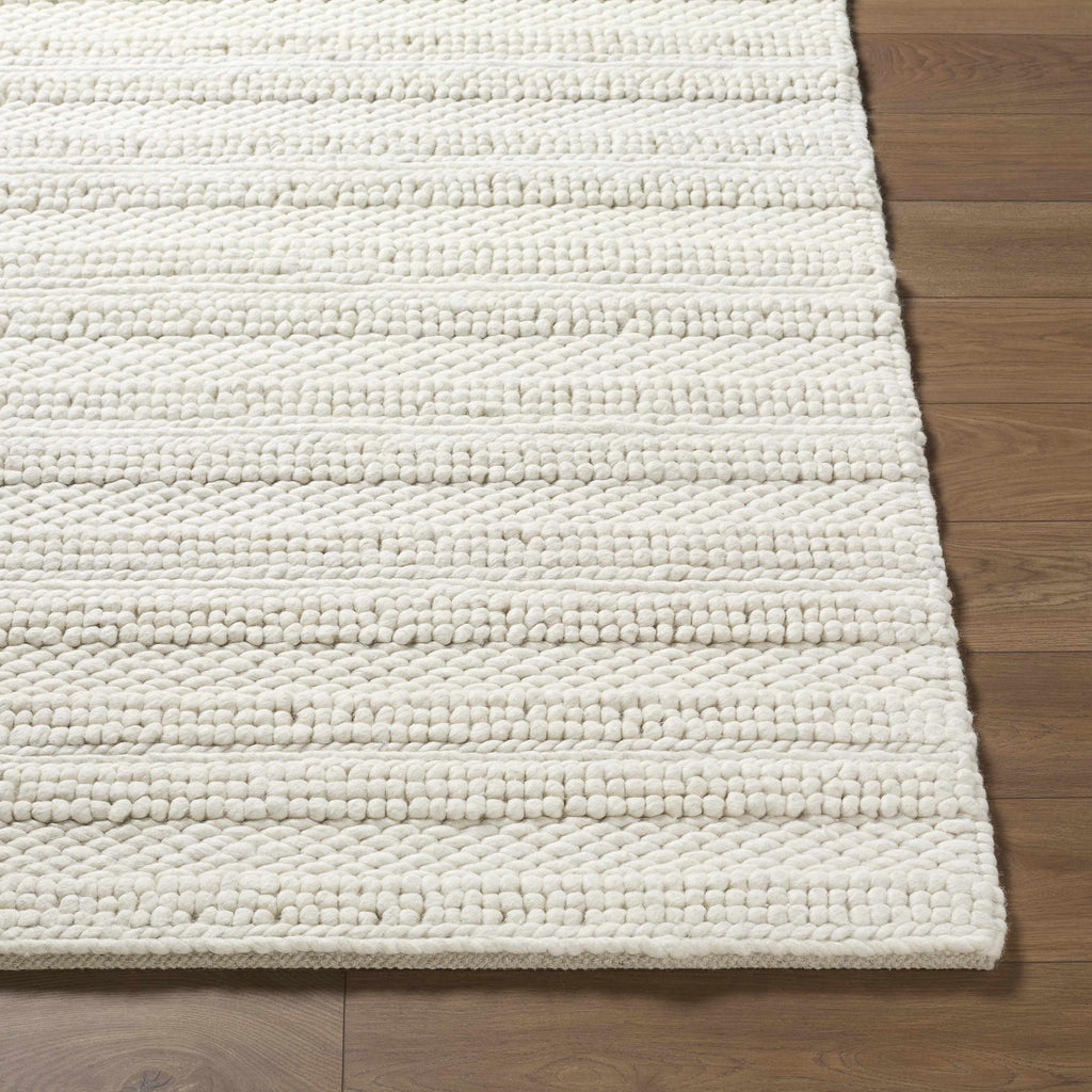 Coskun Area Rug
