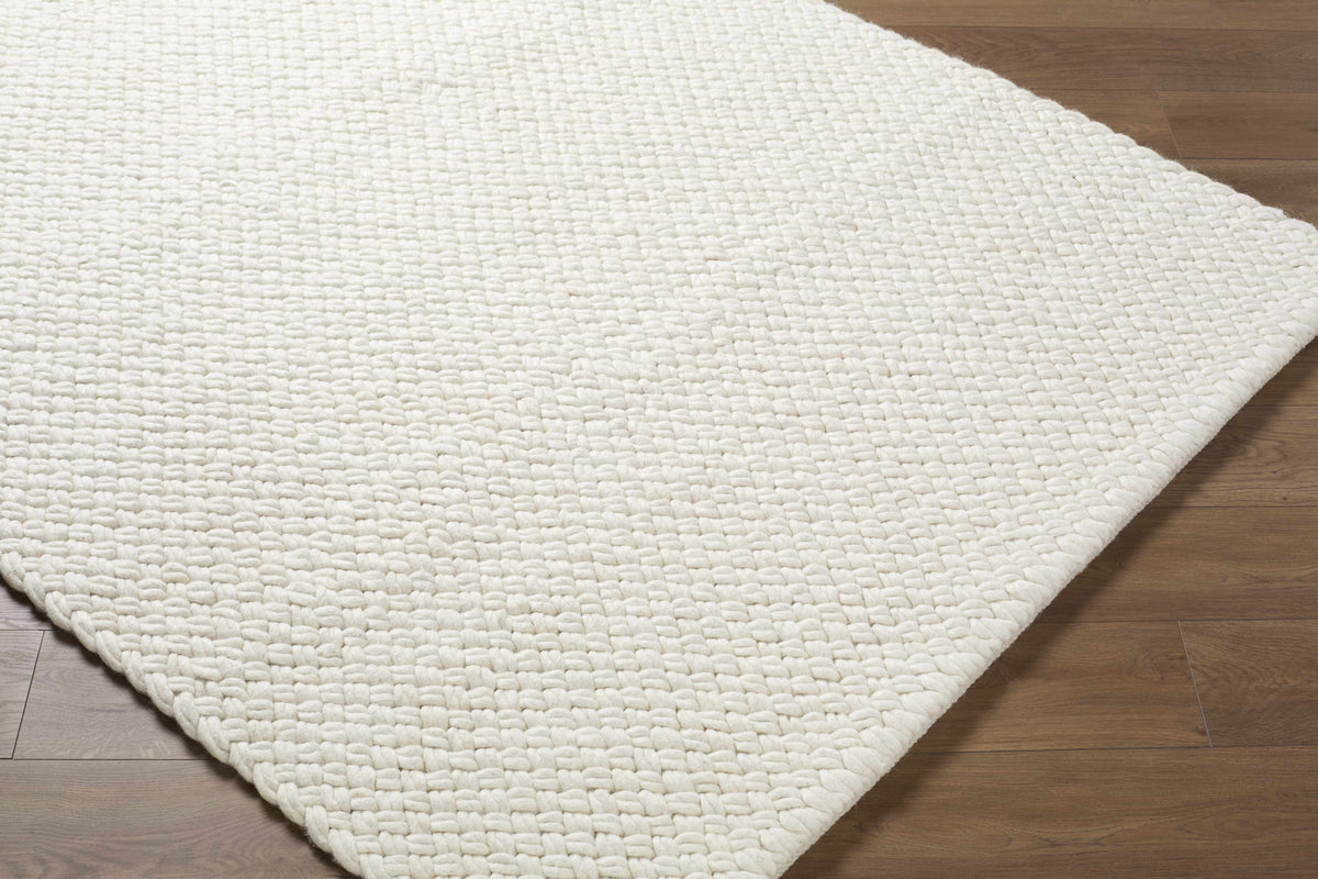 Cqasce Navy Solid Hand Woven Wool Area Rug