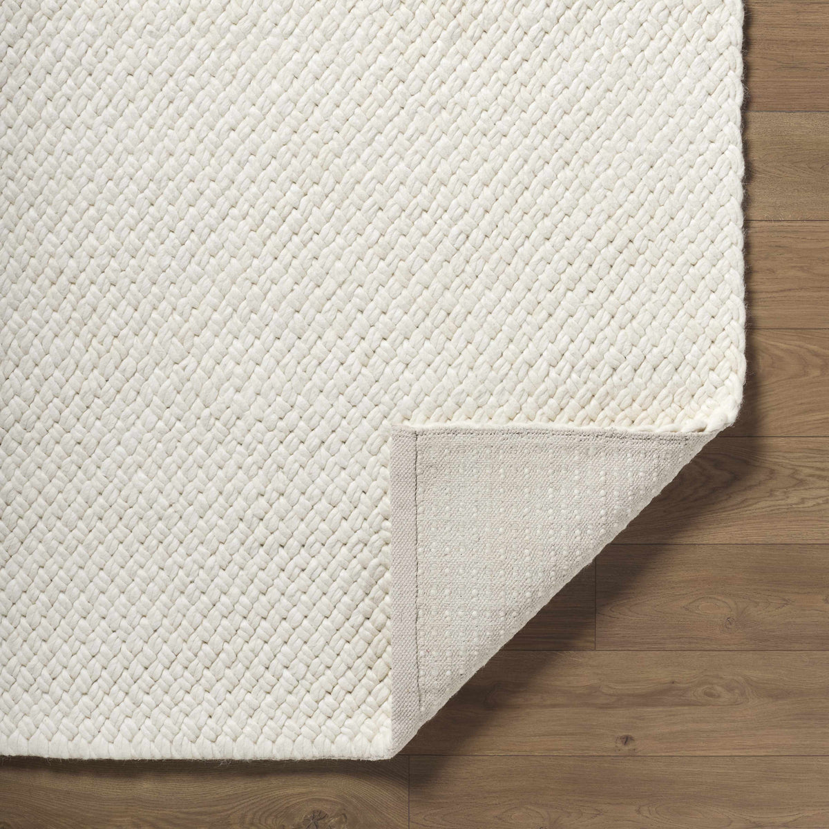 Cqasce Navy Solid Hand Woven Wool Area Rug