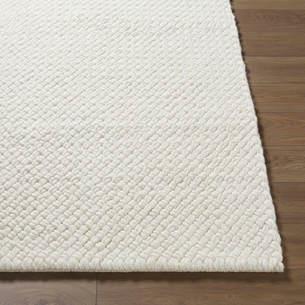 Cqasce Navy Solid Hand Woven Wool Area Rug