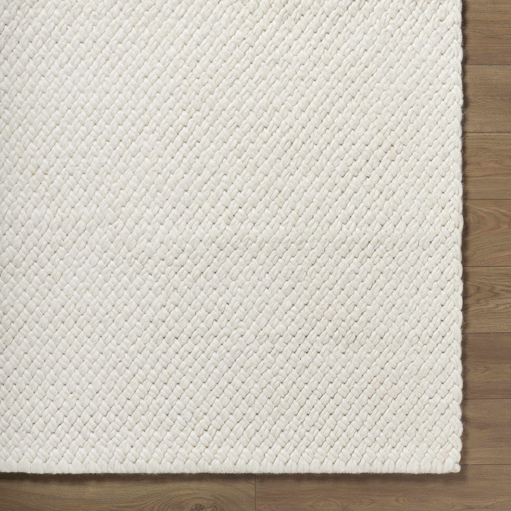 Cqasce Navy Solid Hand Woven Wool Area Rug