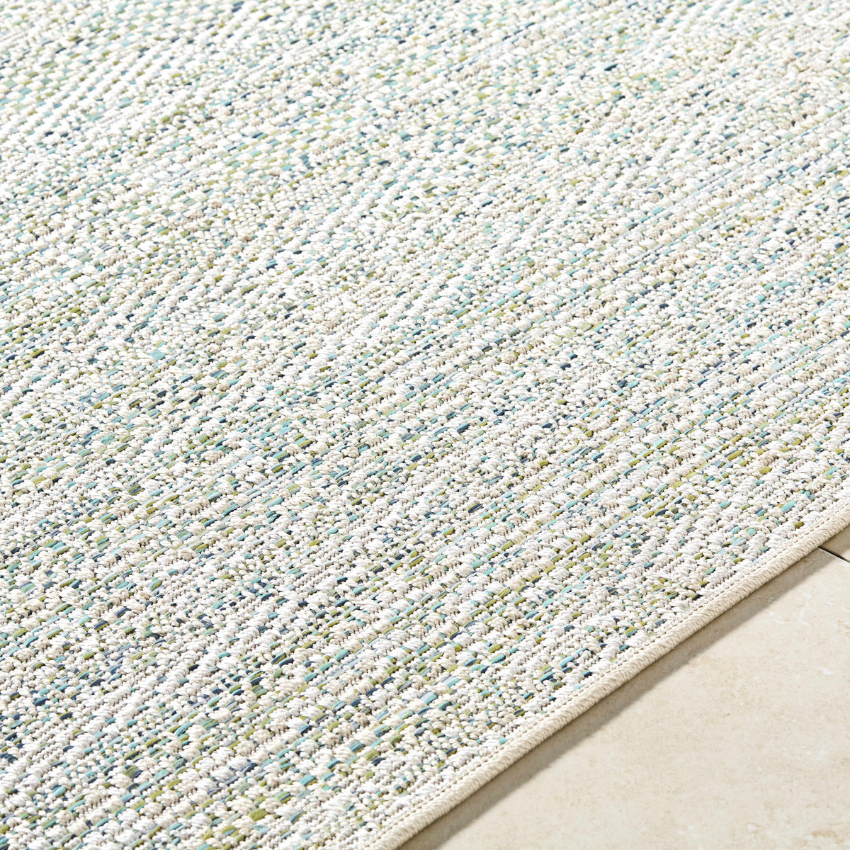 Alezae Ivory Outdoor Area Rug