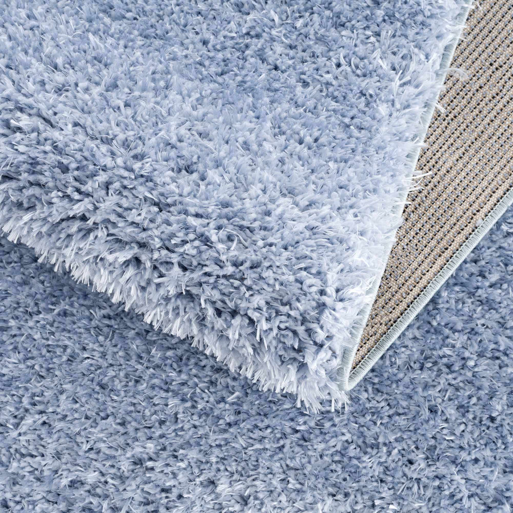Faina Solid Aqua Shag Washable Area Rug