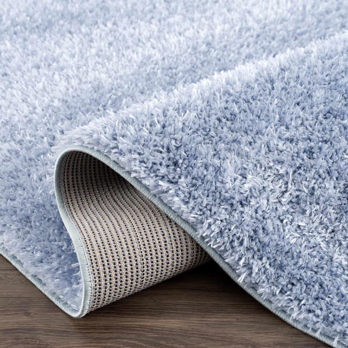 Faina Solid Aqua Shag Washable Area Rug