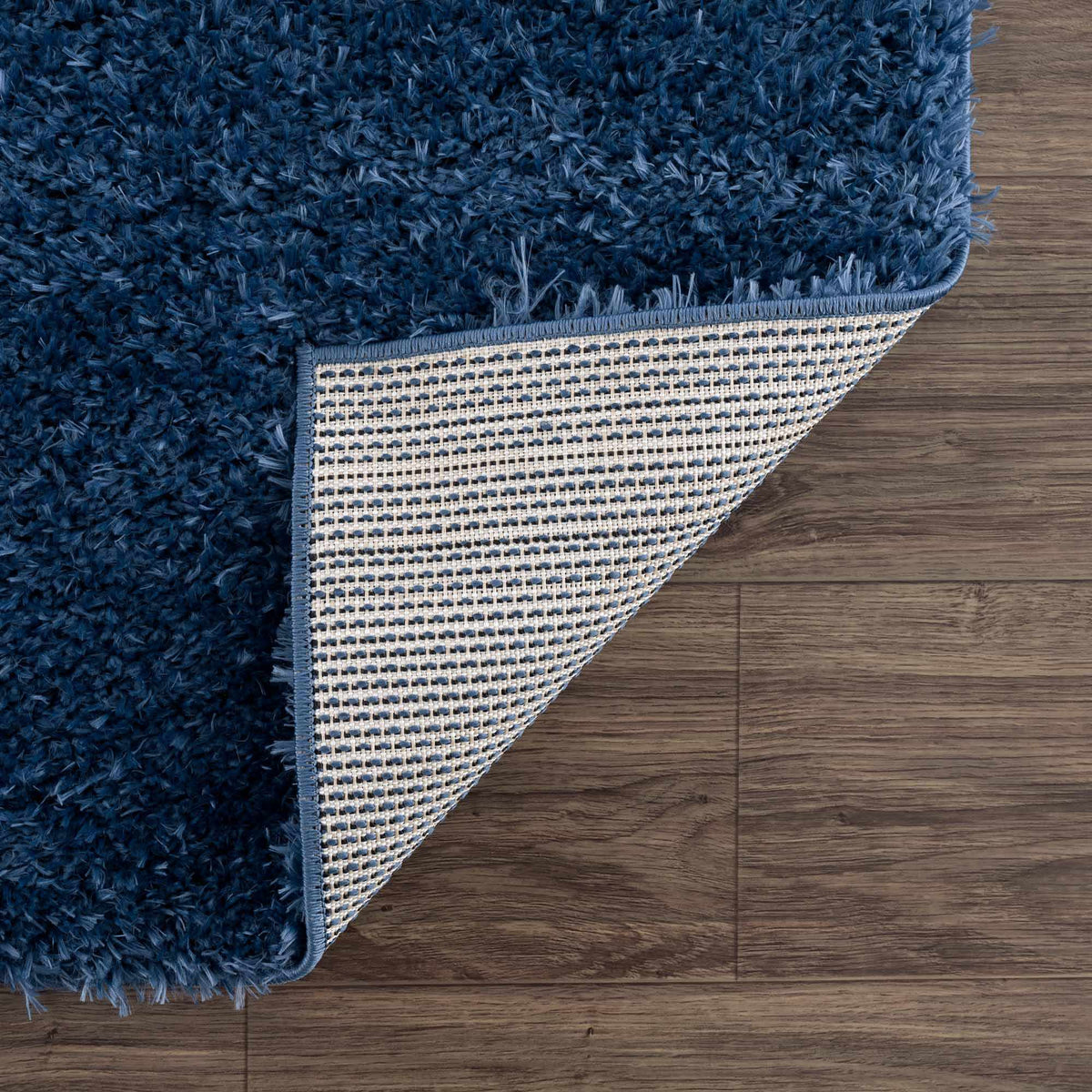 Faina Solid Dark Blue Shag Washable Area Rug