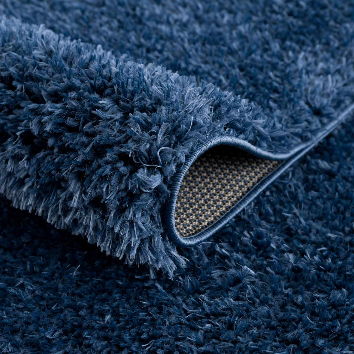 Faina Solid Dark Blue Shag Washable Area Rug
