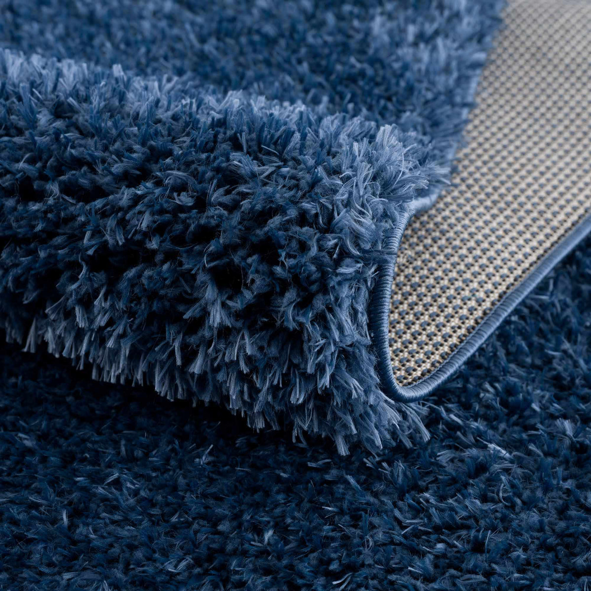 Faina Solid Dark Blue Shag Washable Area Rug
