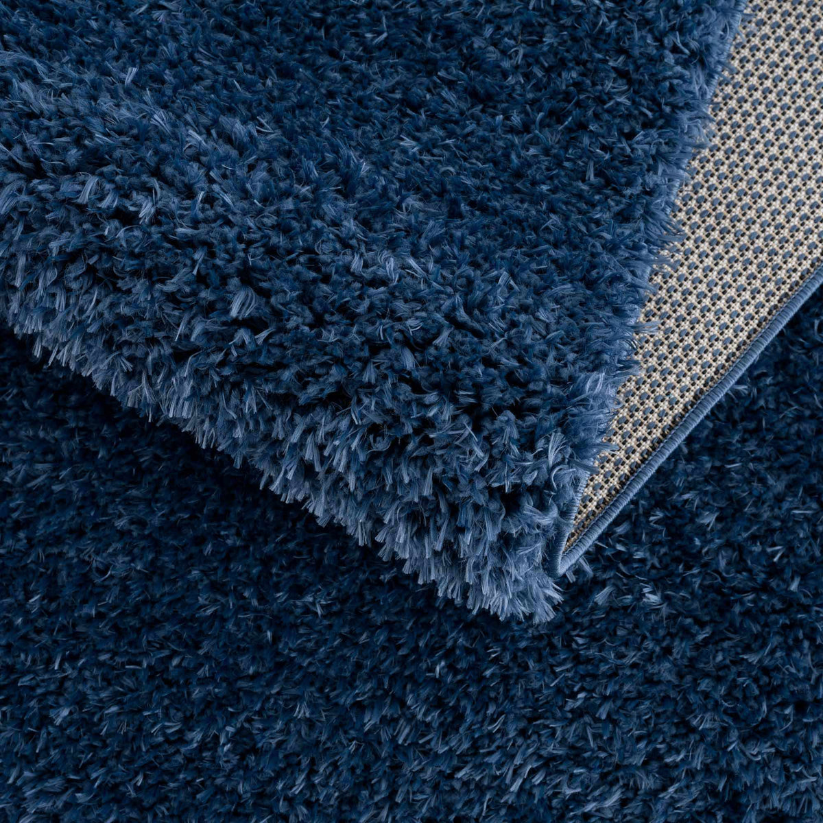 Faina Solid Dark Blue Shag Washable Area Rug