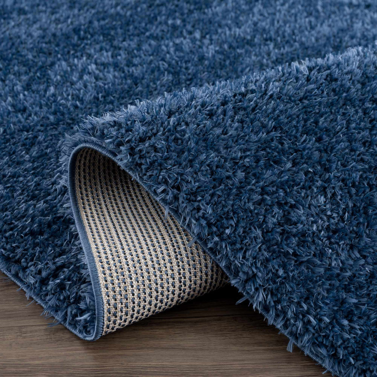 Faina Solid Dark Blue Shag Washable Area Rug