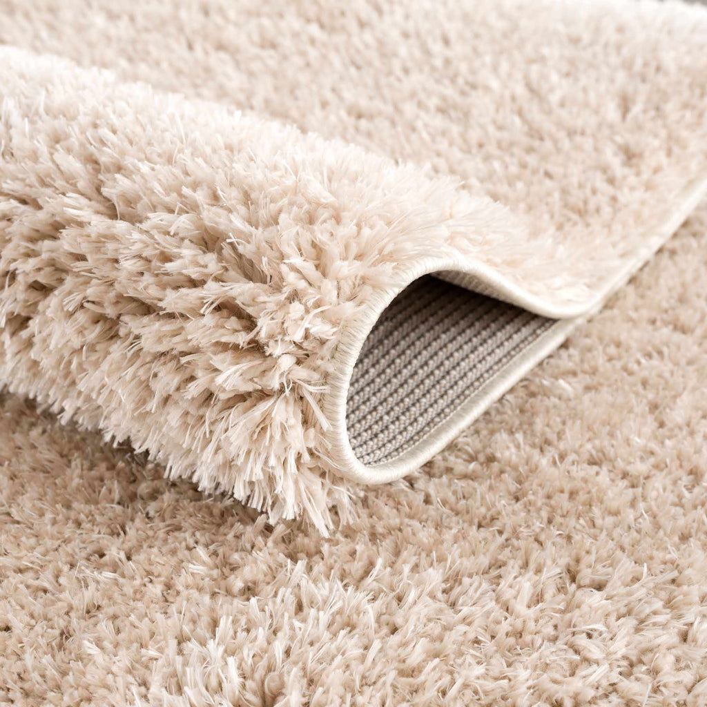 Faina Solid Beige Shag Washable Area Rug - Clearance