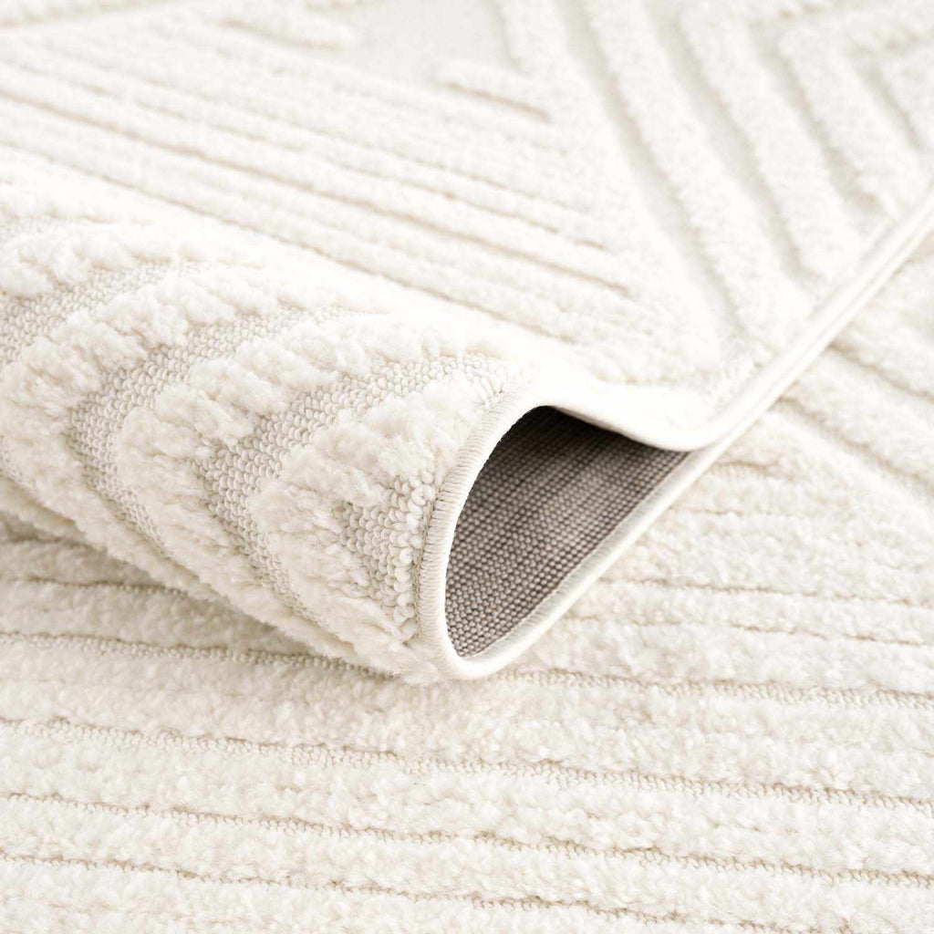 Manyas 3D Bone Area Rug with Tassels - Clearance
