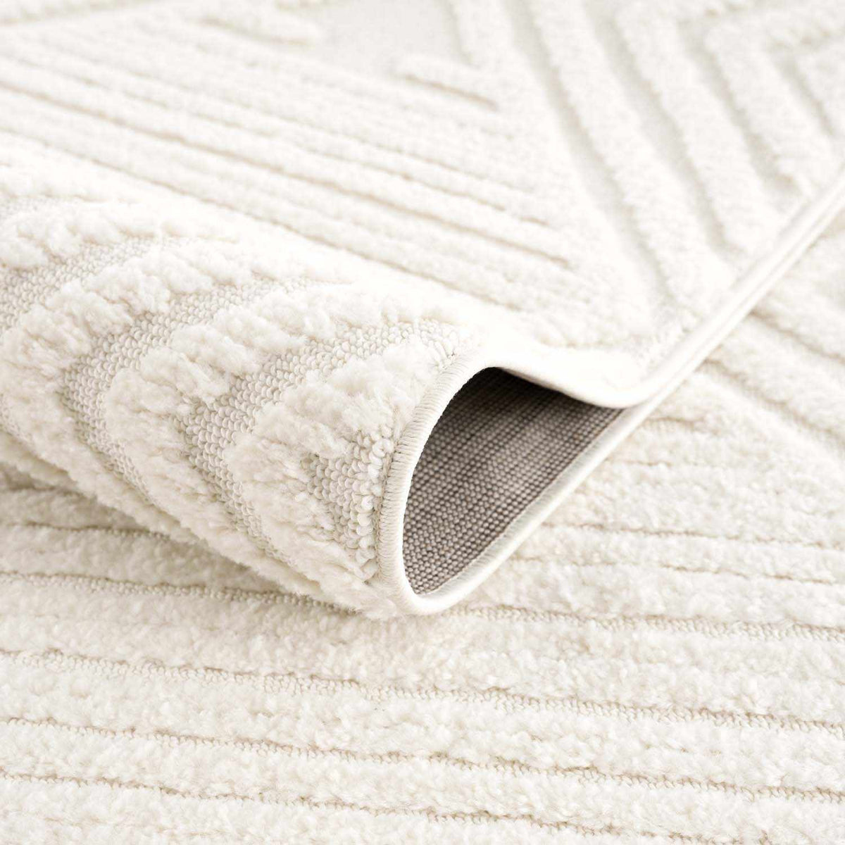 Manyas 3D Bone Area Rug with Tassels - Clearance