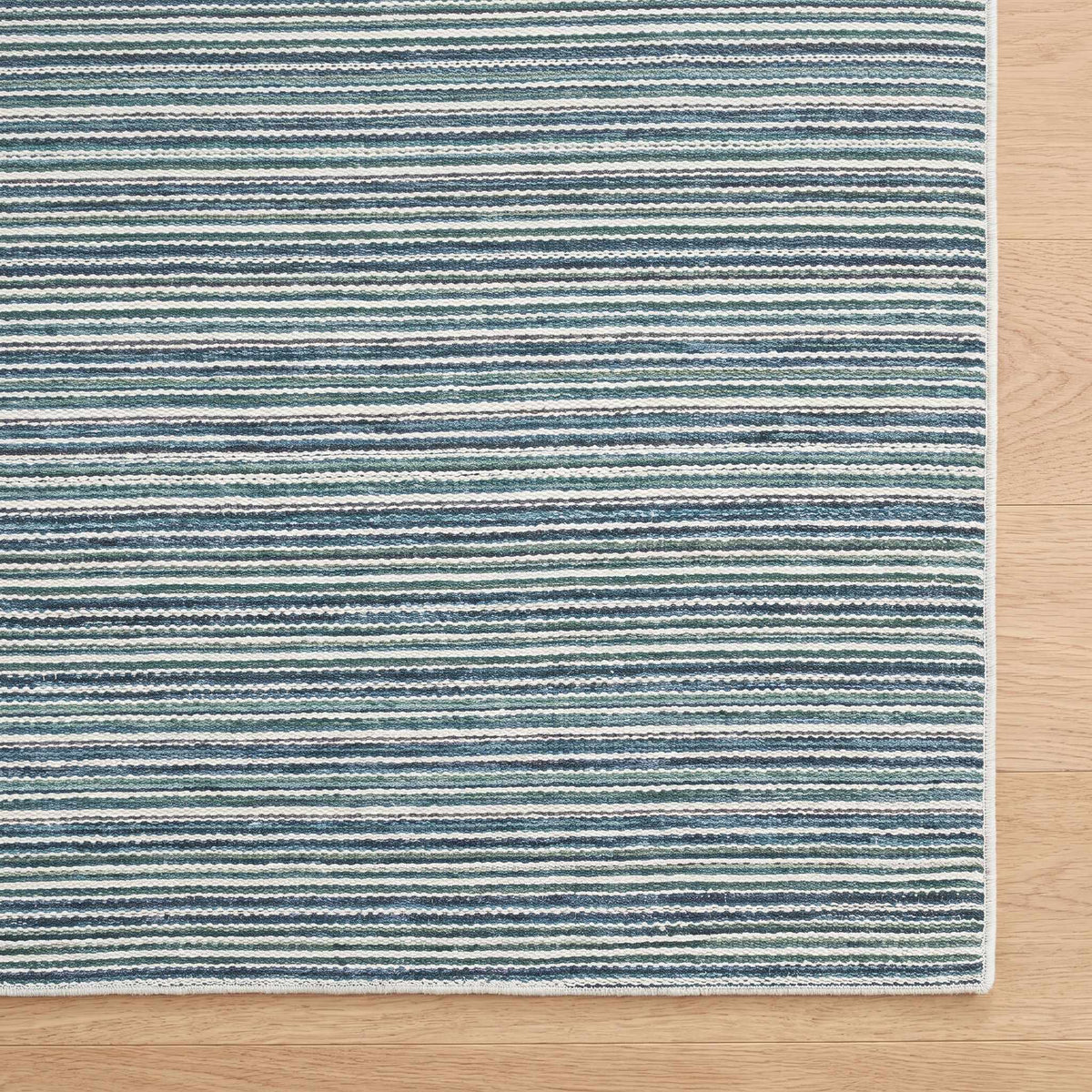 Jachai Blue Straped Washable Area Rug