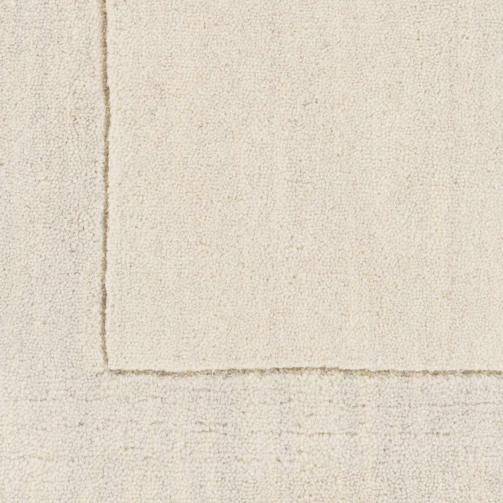Bordered Solid Beige Cream Wool Rug