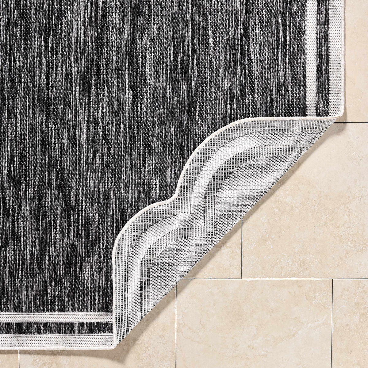 Arnola Black Outdoor Rug