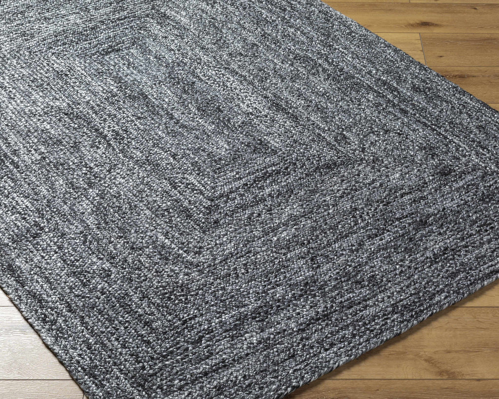 Kenyi Black Area Rug - Clearance