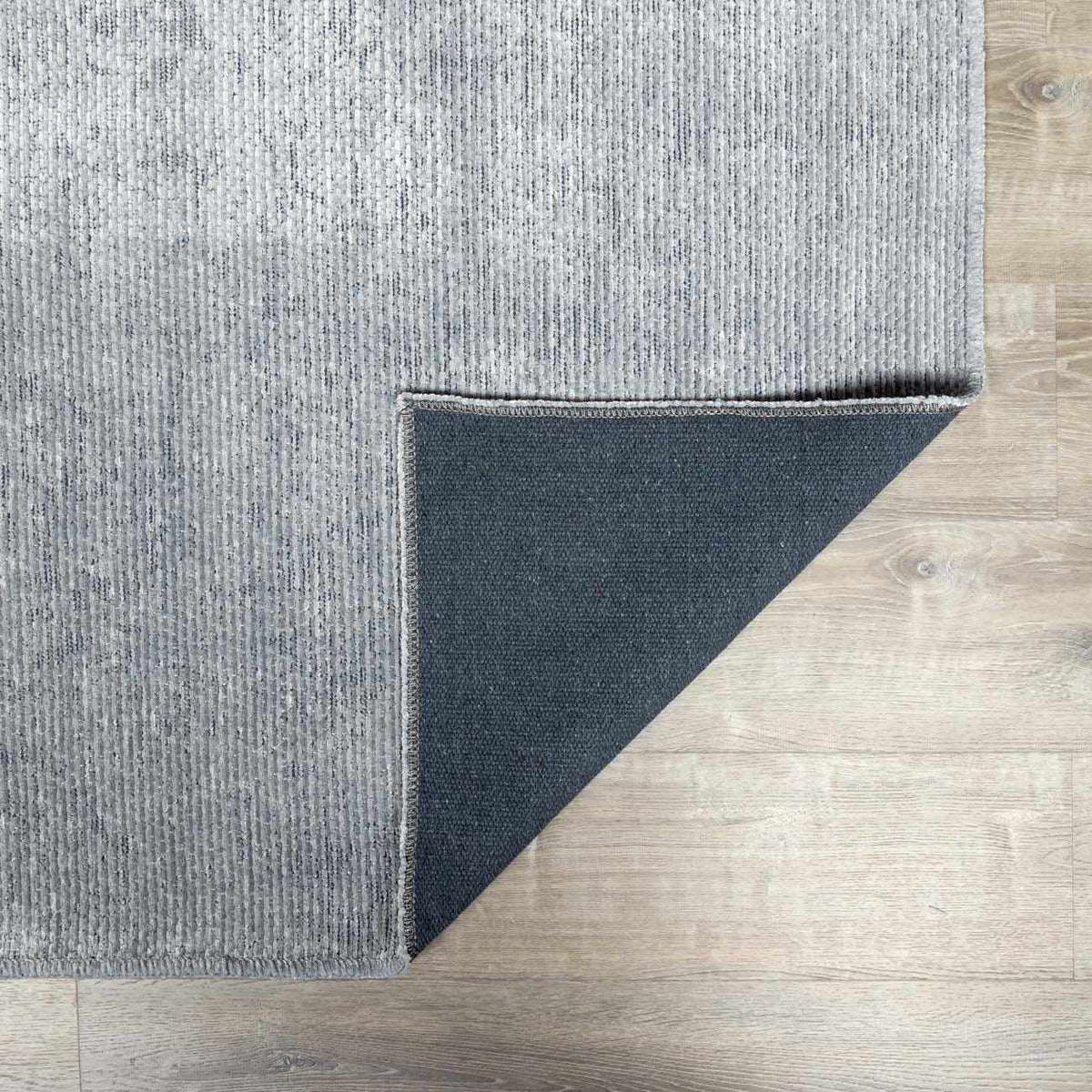 Isako Blue & Gray Solid Washable Area Rug - Clearance
