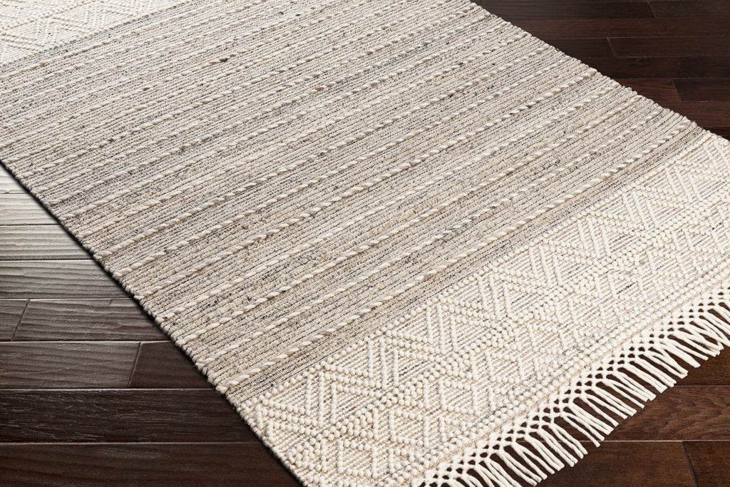 Cream Veruela Wool Blend Braided Tassel Area Rug