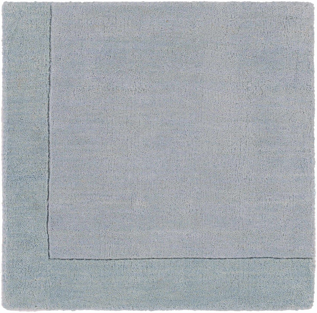 Arkabutla Solid Blue Bordered Wool Rug