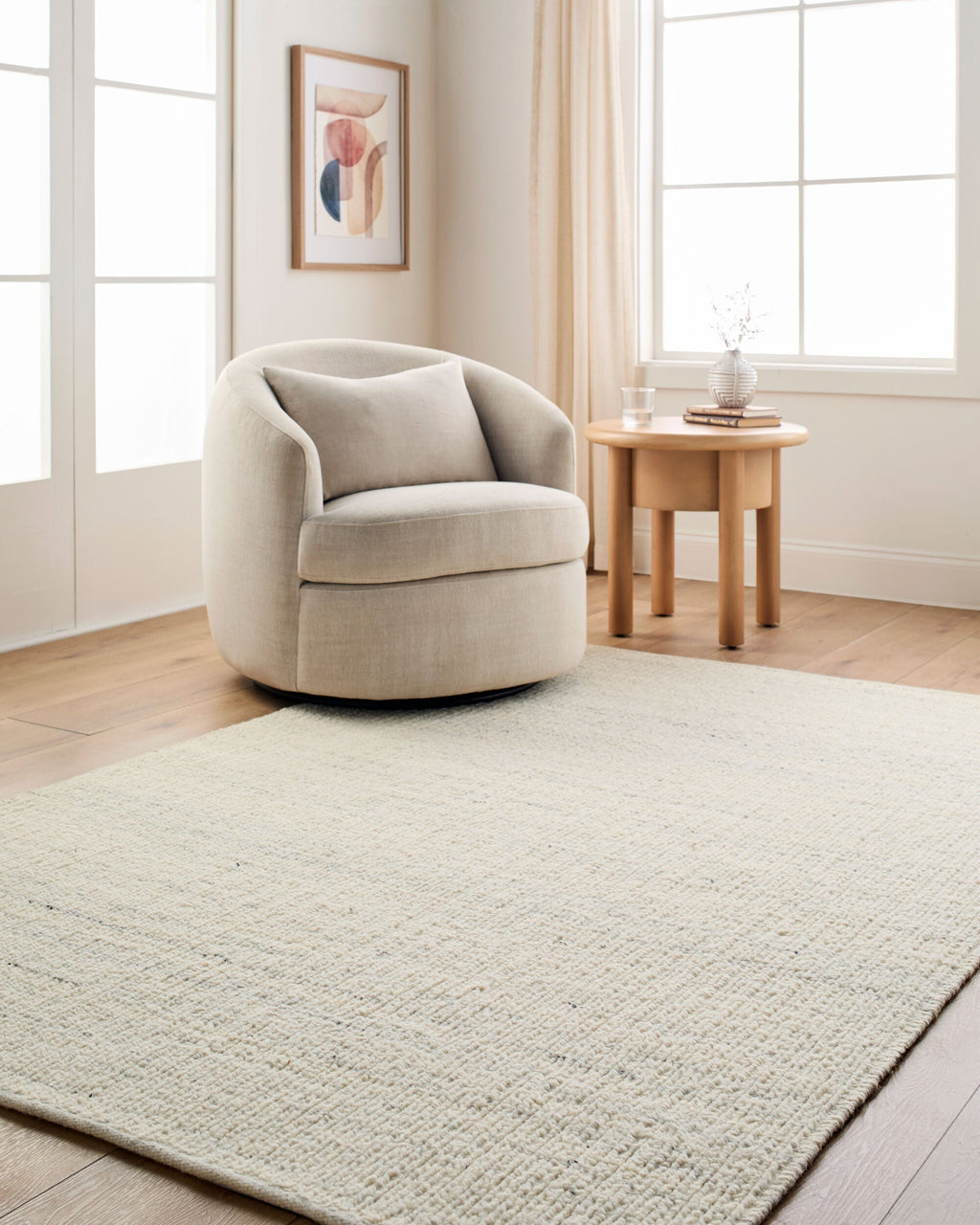 Padoo Ivory Solid Hand Woven Wool Area Rug