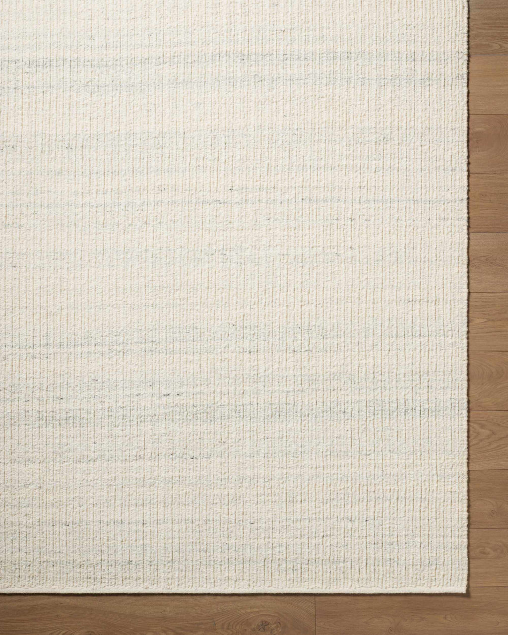 Padoo Ivory Solid Hand Woven Wool Area Rug