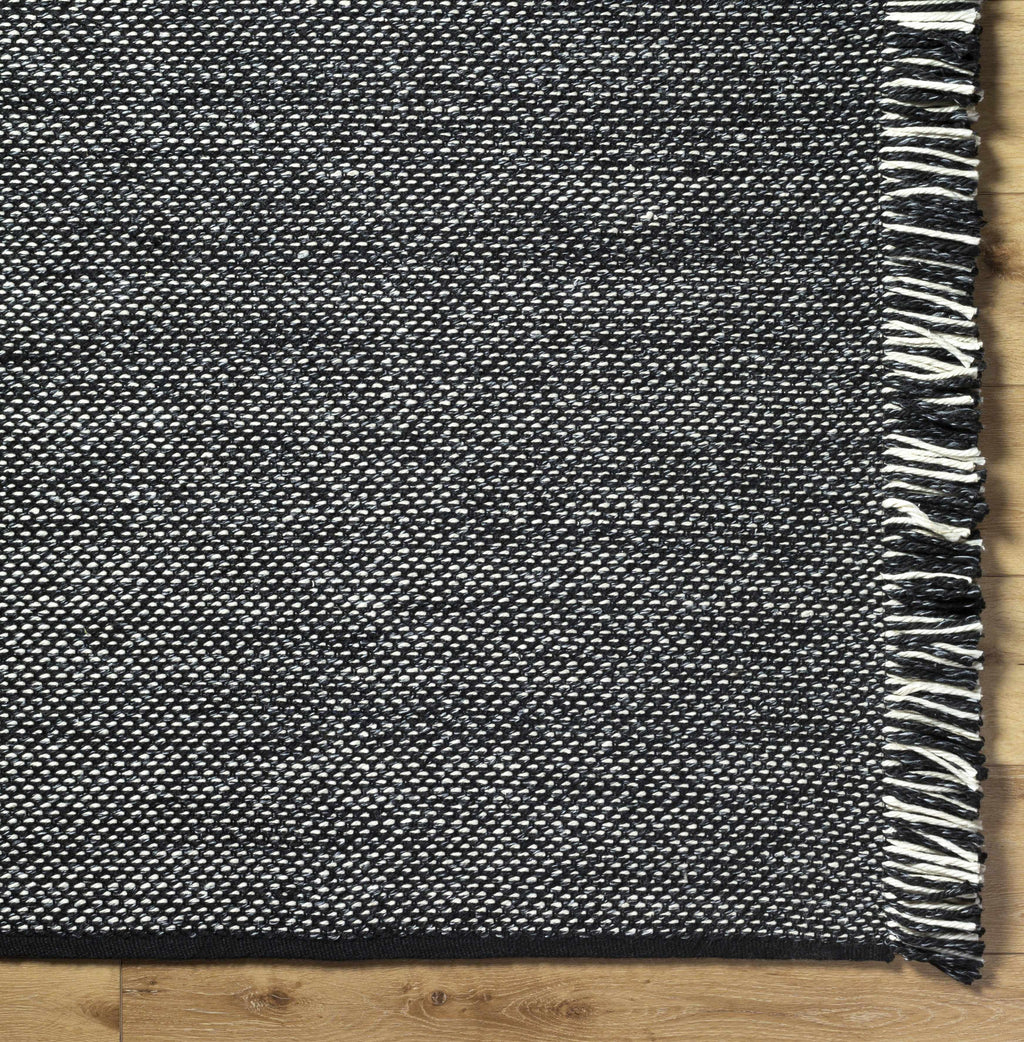 Boyden Black Area Rug with Tassels - Clearance