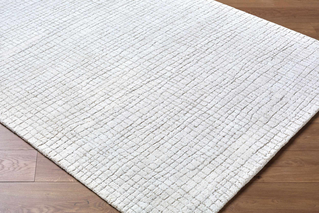 Kynton Ivory Modern Minimalist Handmade Area Rug