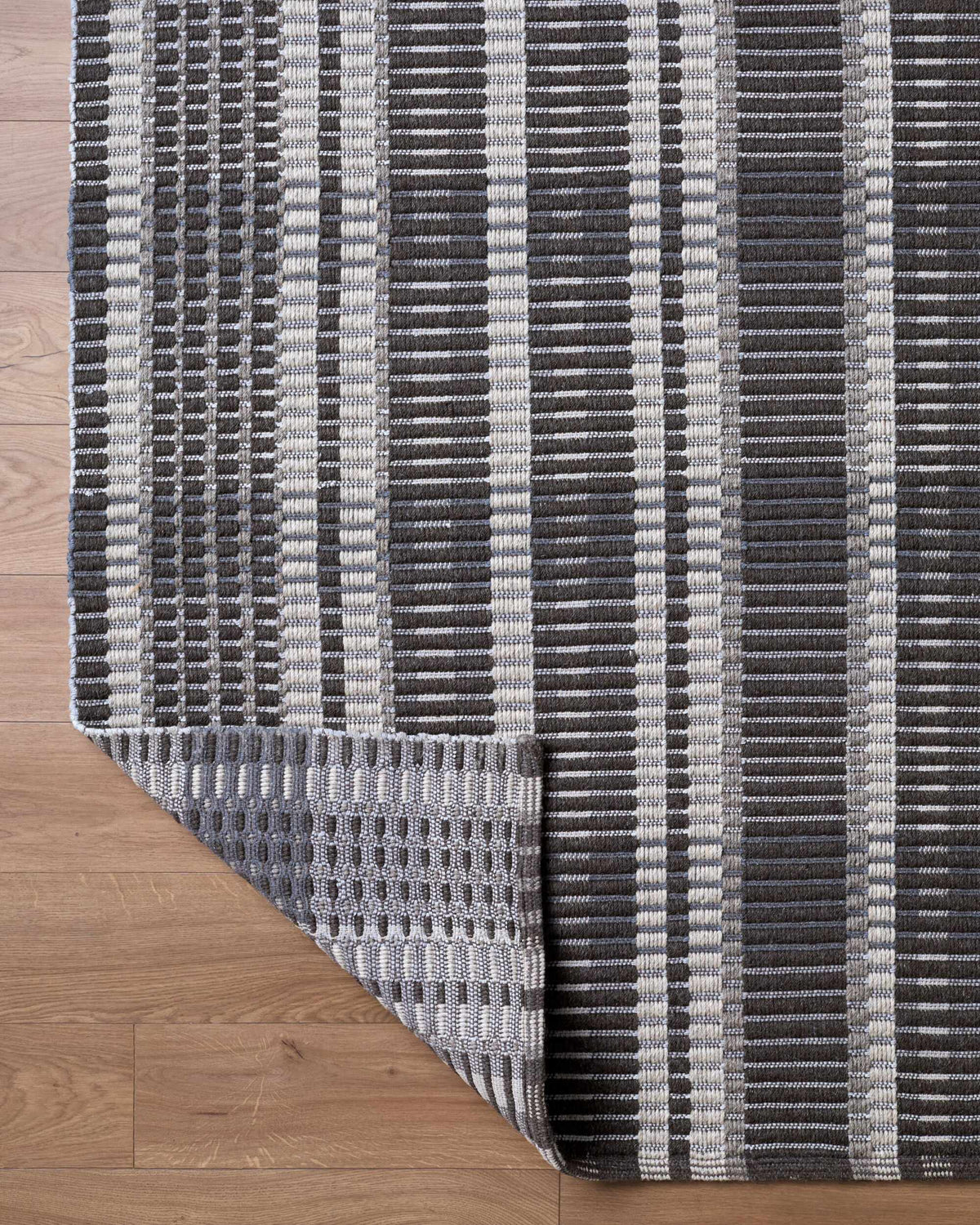 Idonia Striped Wool Area Rug