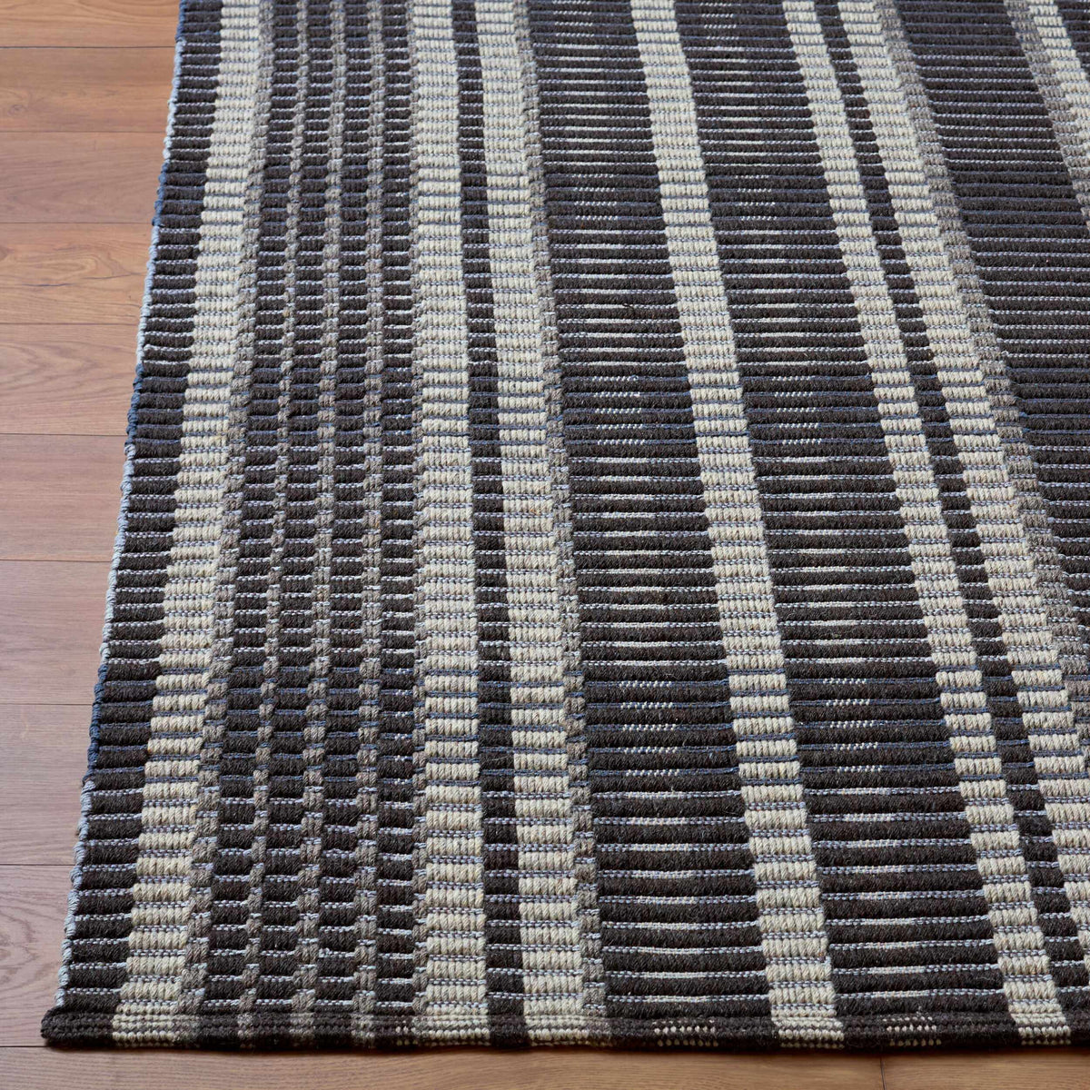 Idonia Striped Wool Area Rug