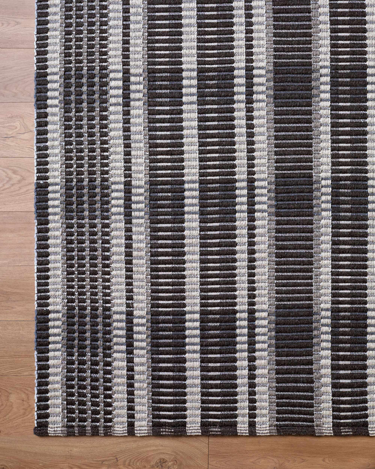 Idonia Striped Wool Area Rug