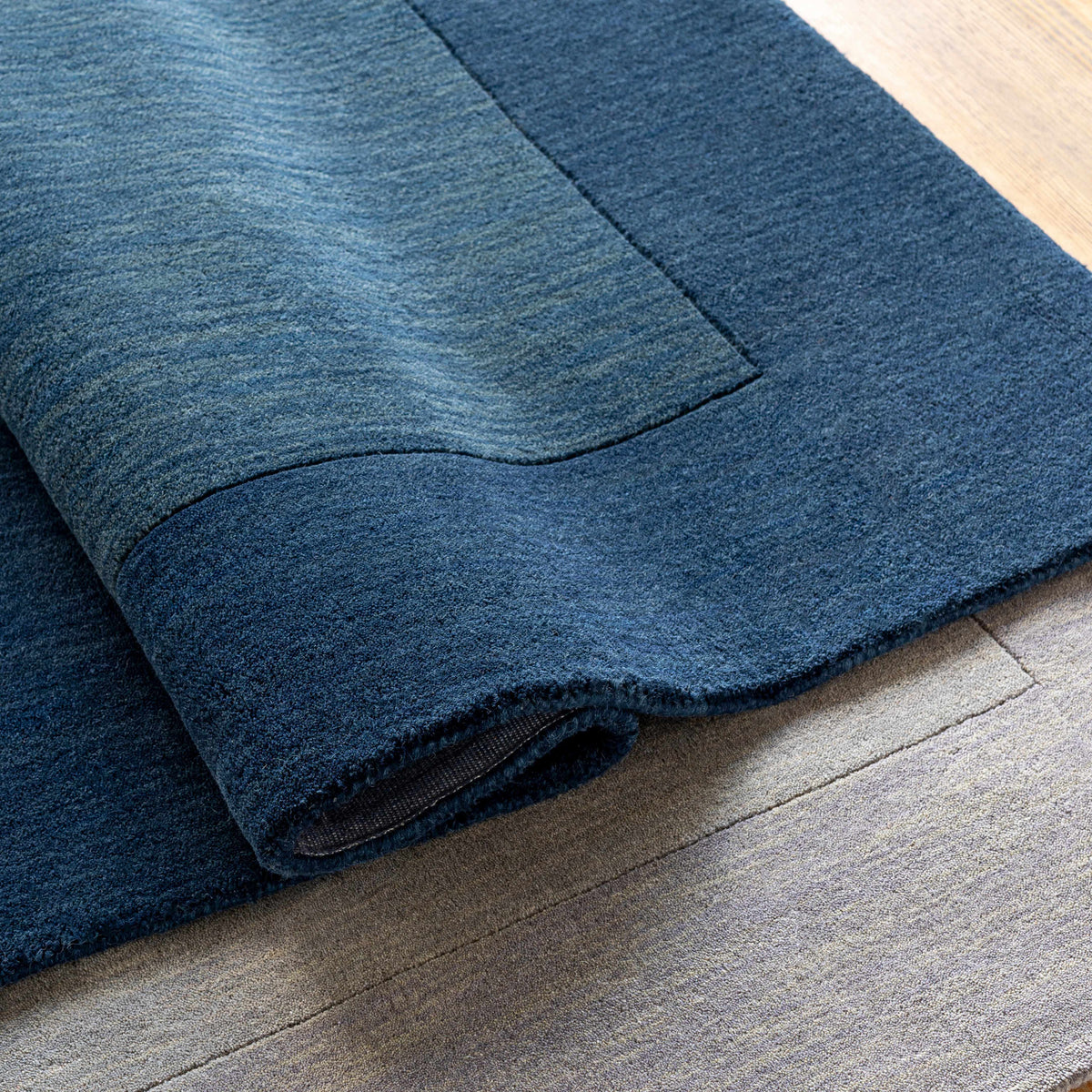 Bordered Solid Ink Blue Wool Rug