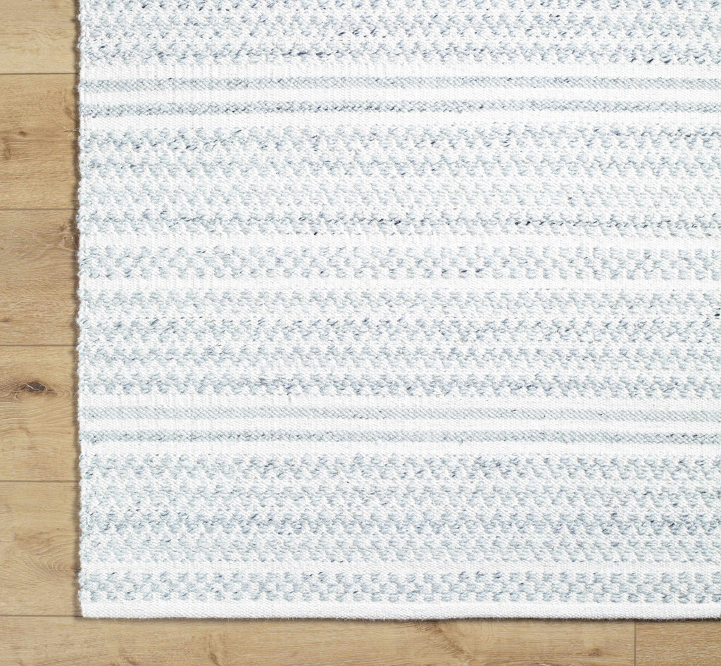 Kendi Cream Area Rug - Clearance