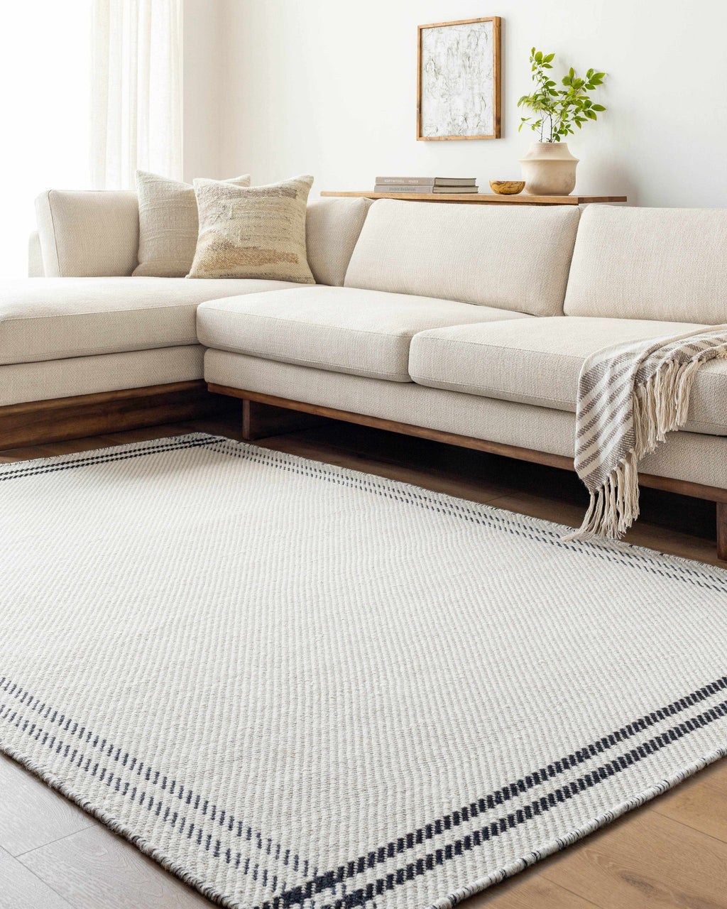 Nimue Cream & Blue Bordered Area Rug - Clearance