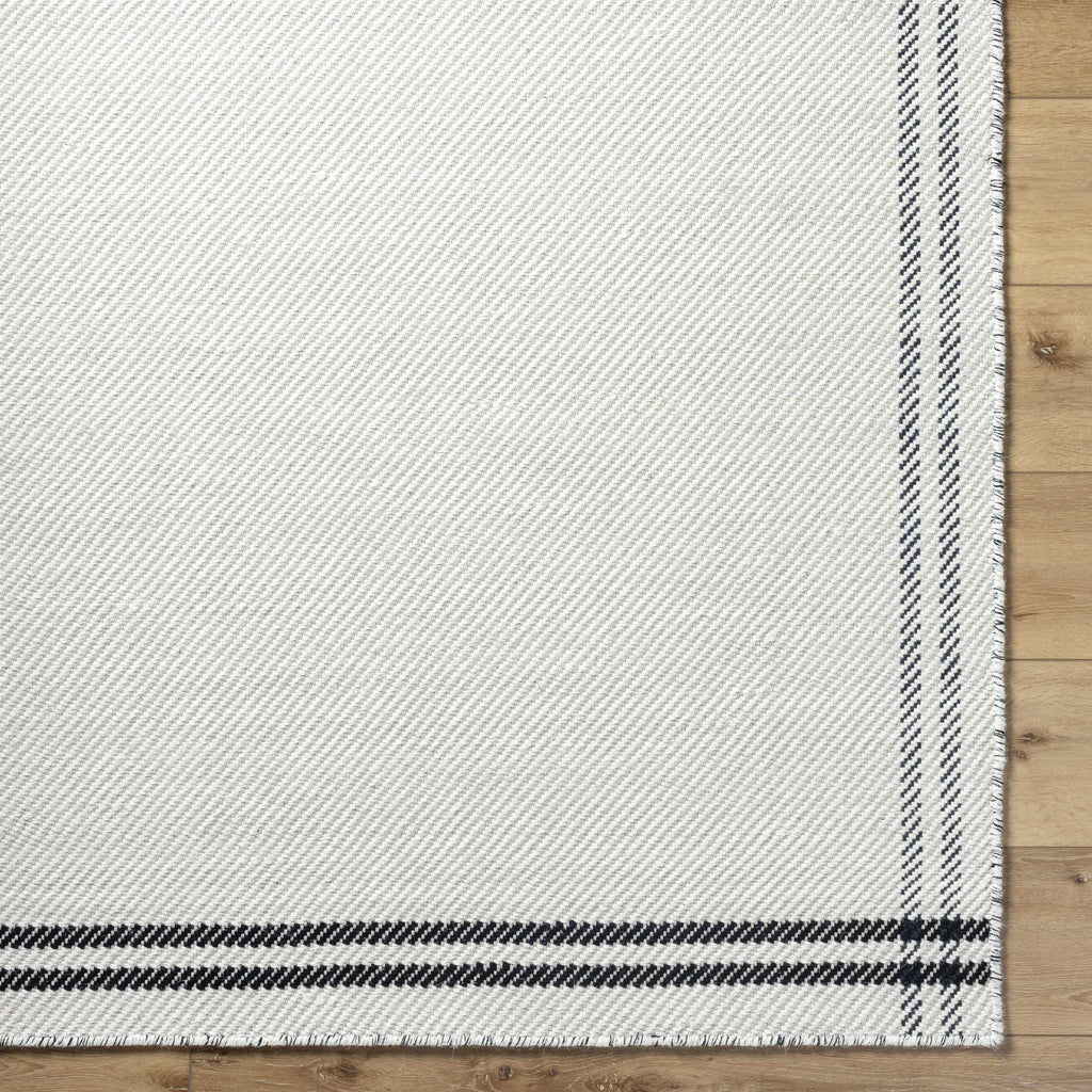 Nimue Cream & Blue Bordered Area Rug - Clearance
