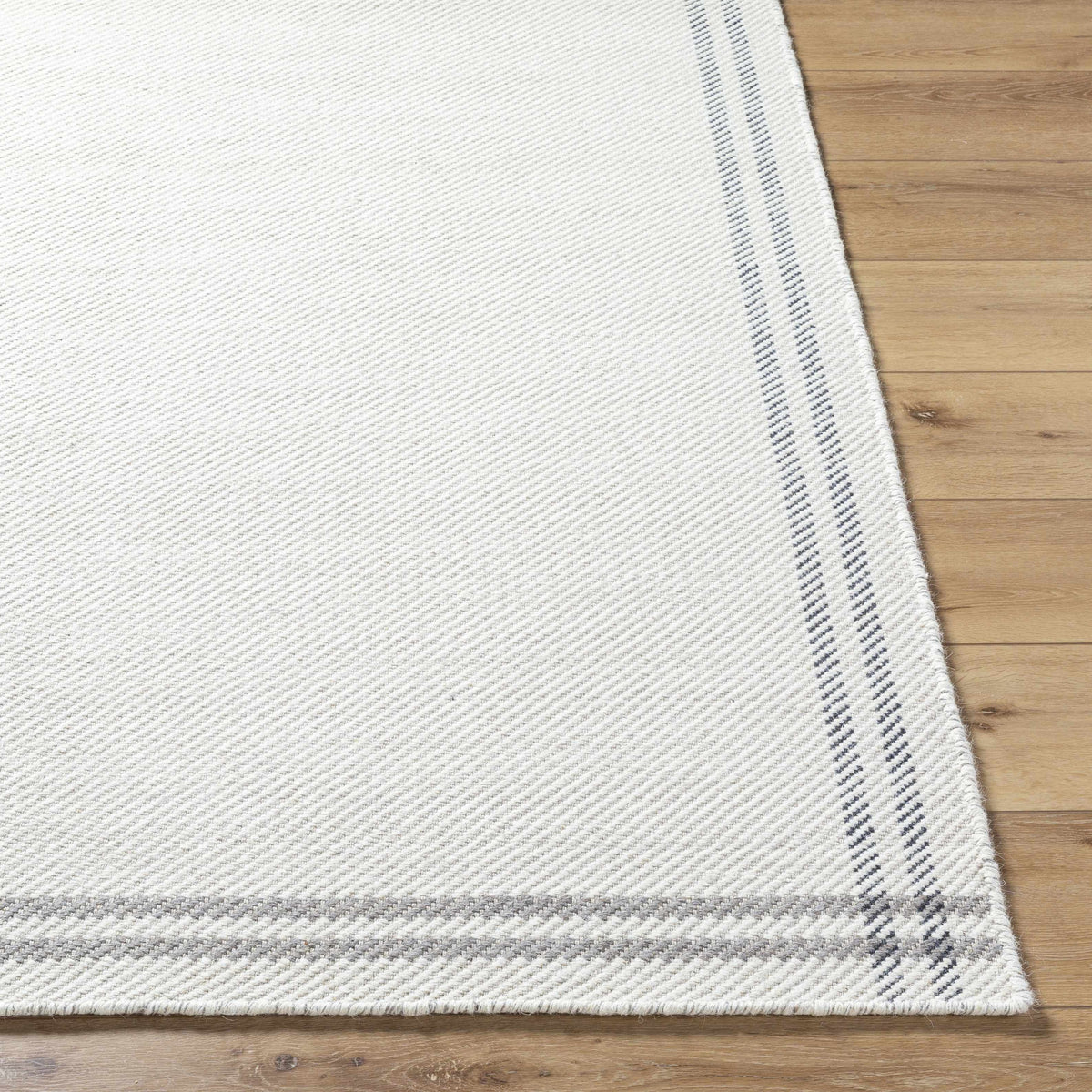 Nimue Cream & Charcoal Bordered Area Rug - Clearance