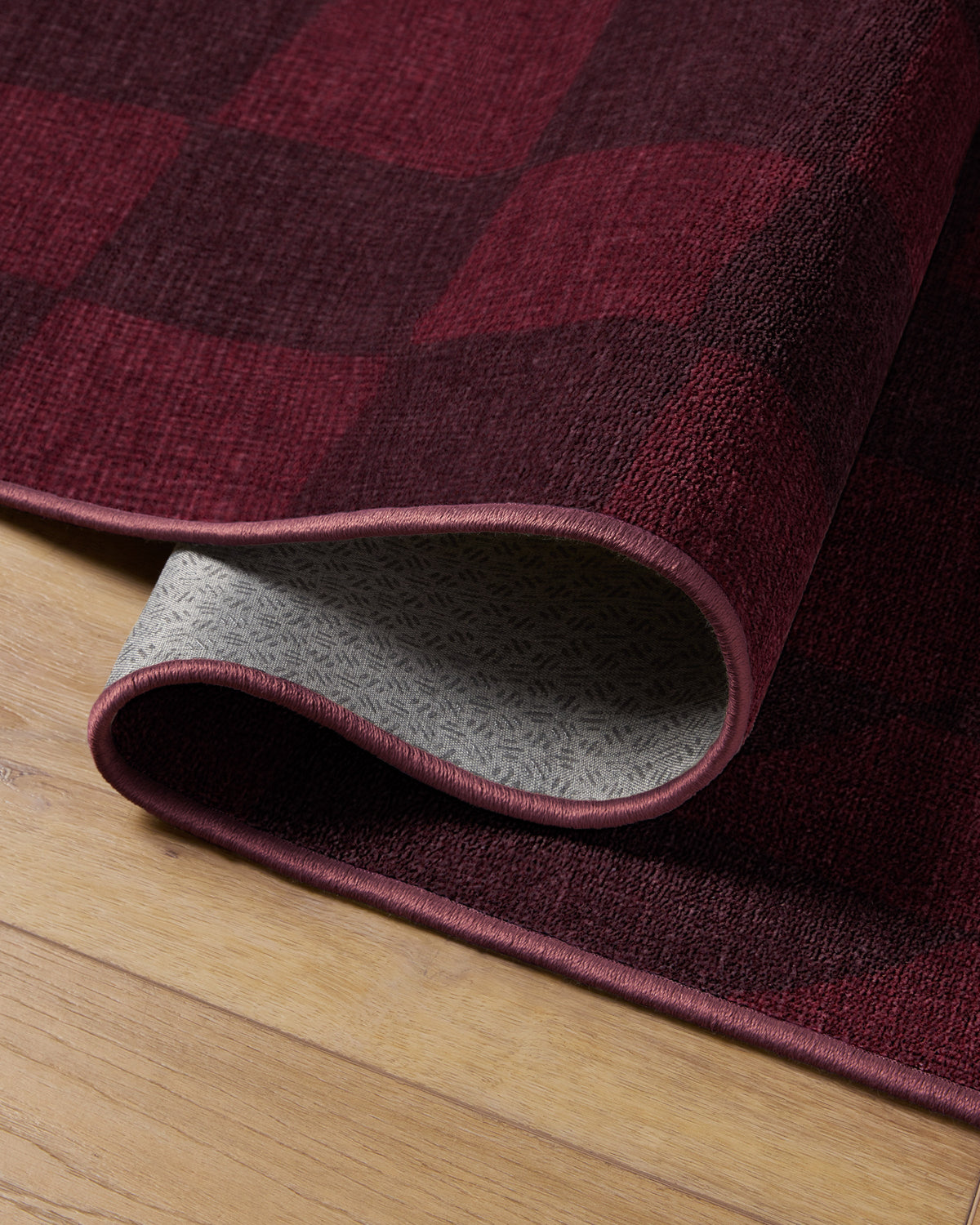 Ricardo Checkerboard Burgundy Rug by Humberto Leon