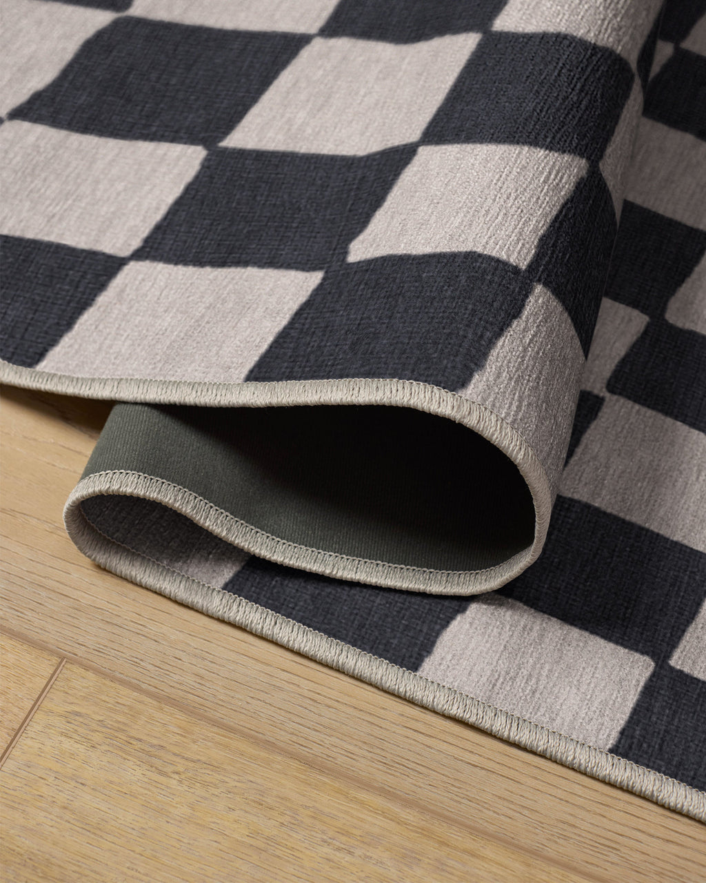 Ricardo Checkerboard Ivory & Black Flatwoven Rug by Humberto Leon