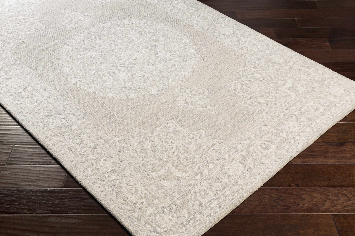 Roessleville Cream Wool Area Rug