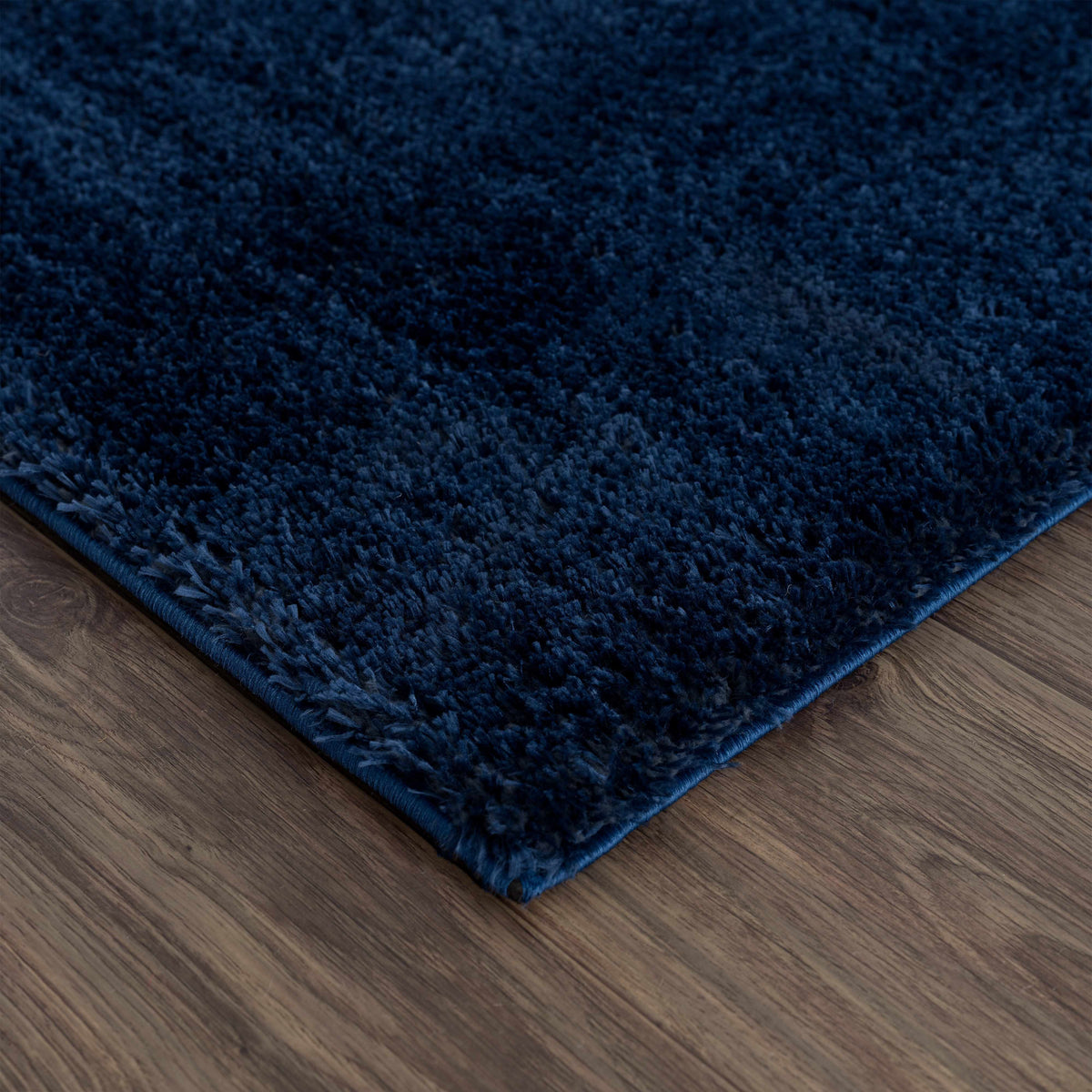 Navero Dark Blue Subtle Wavy Abstract Modern Minimalist Polyester Machine Woven Area Rug - Clearance