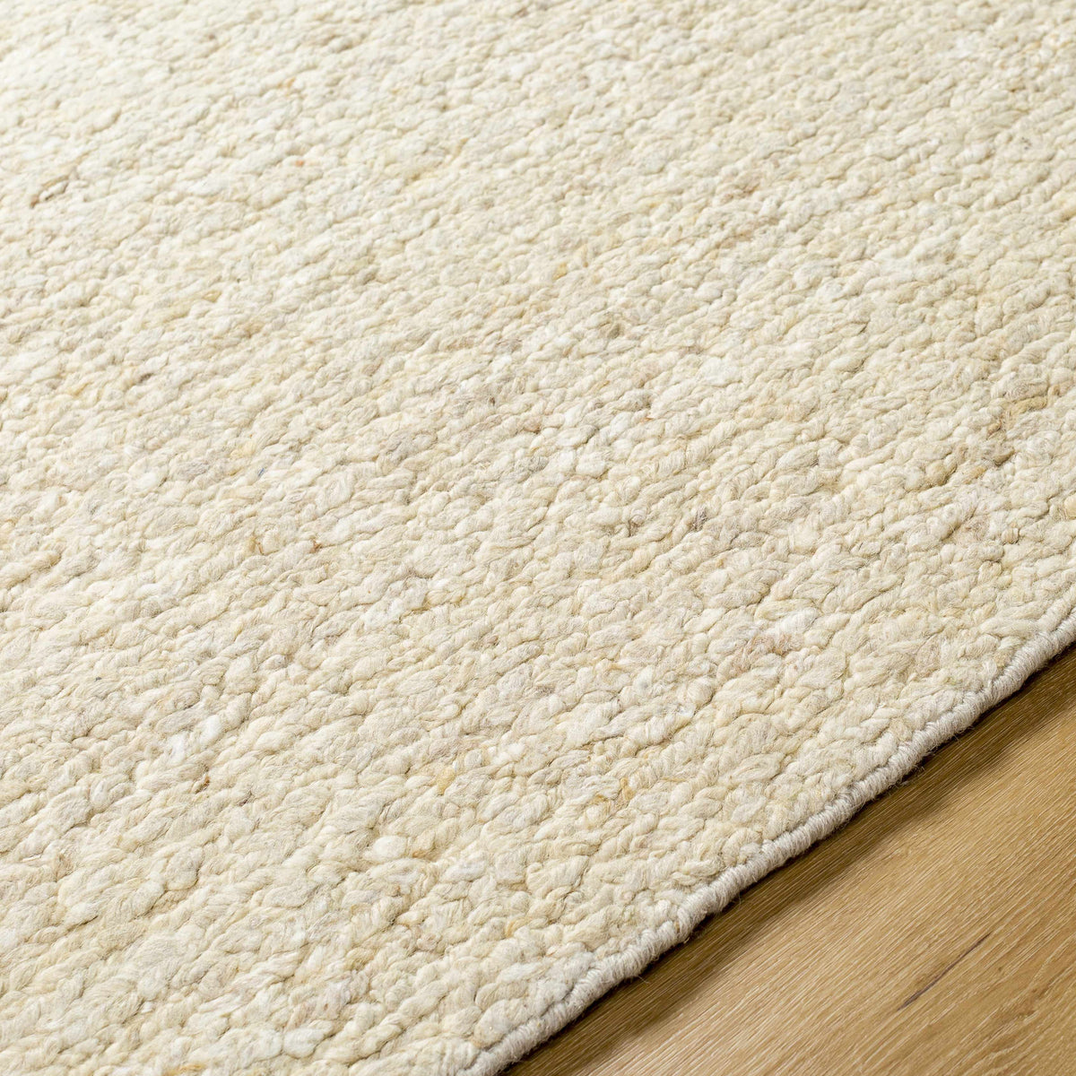 Sera Cream Hand Knotted Wool Area Rug - Clearance