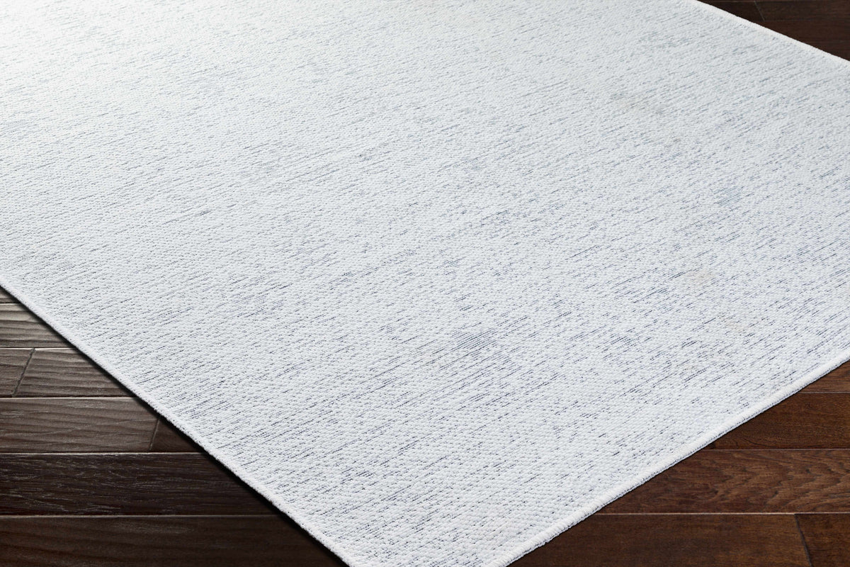 Isako Cream & Gray Solid Washable Area Rug - Clearance