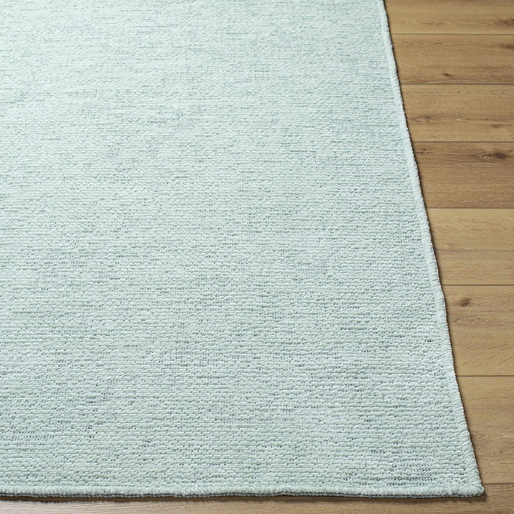Isako Seafoam Solid Washable Area Rug - Clearance