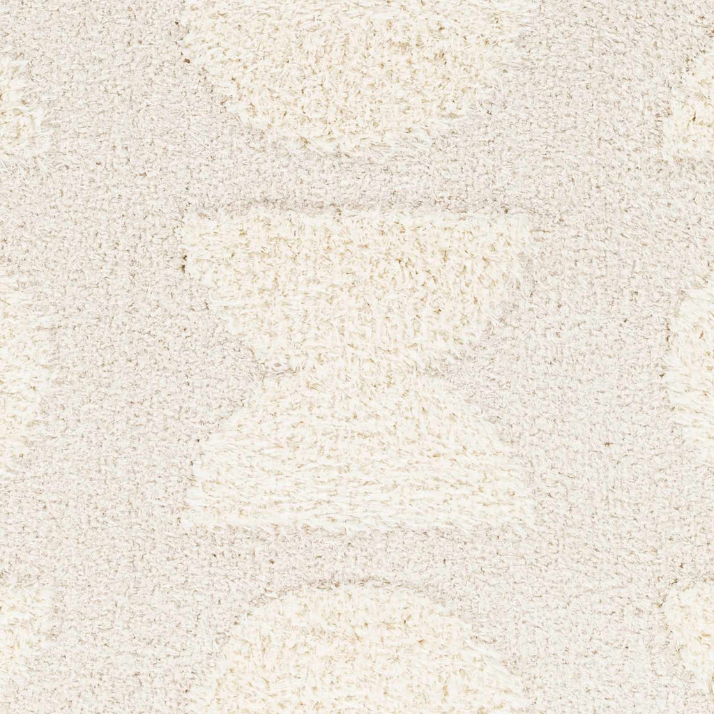 Dason Cream Area Rug - Clearance