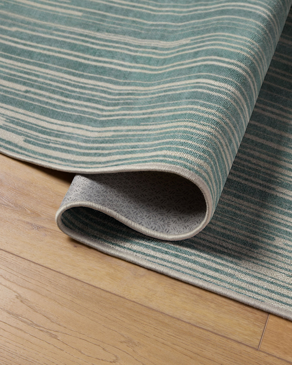 Striated Border Blue Rug
