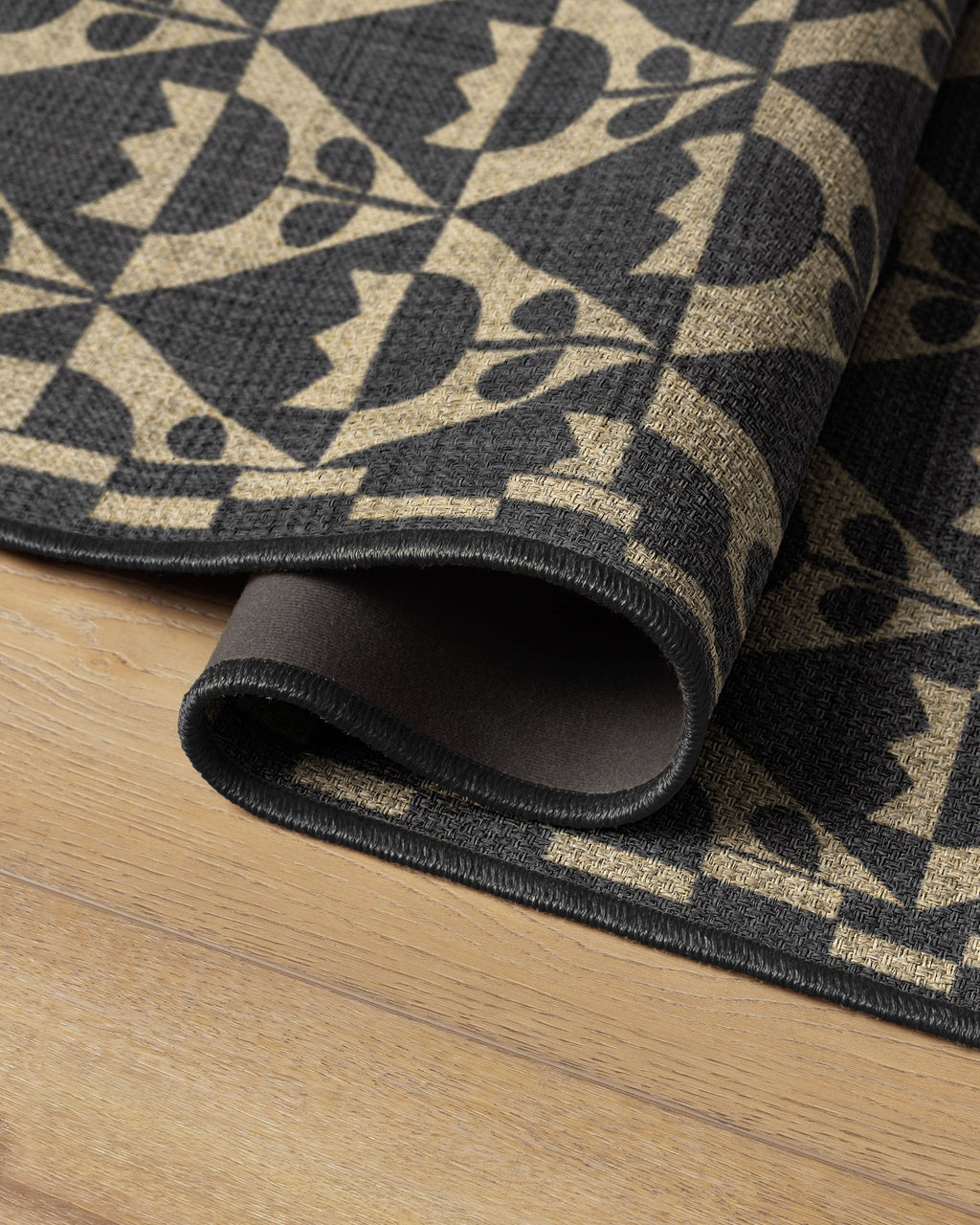 Tulip Heaven Black & Natural Re-Jute Rug by Dan Pelosi