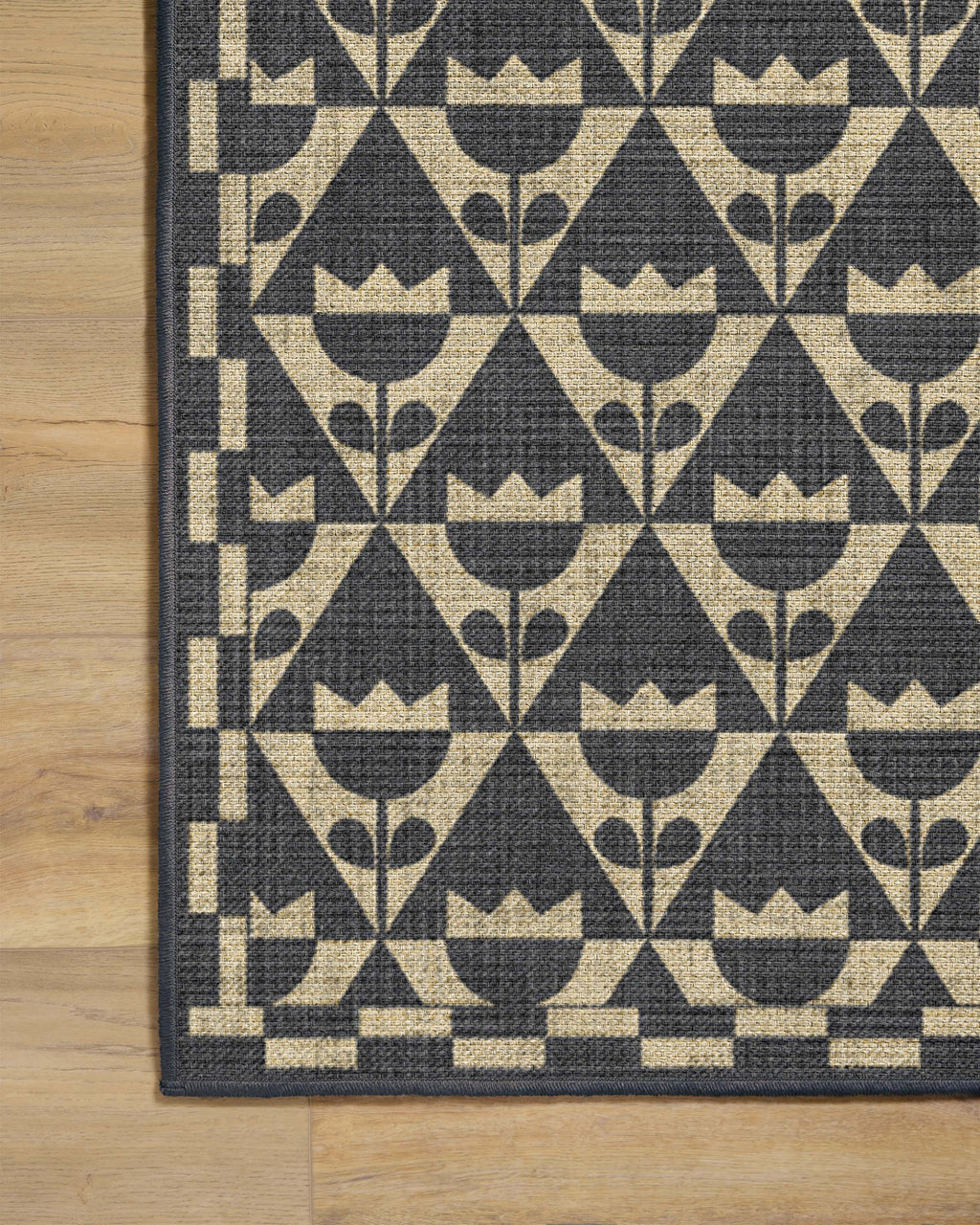 Tulip Heaven Black & Natural Re-Jute Rug by Dan Pelosi